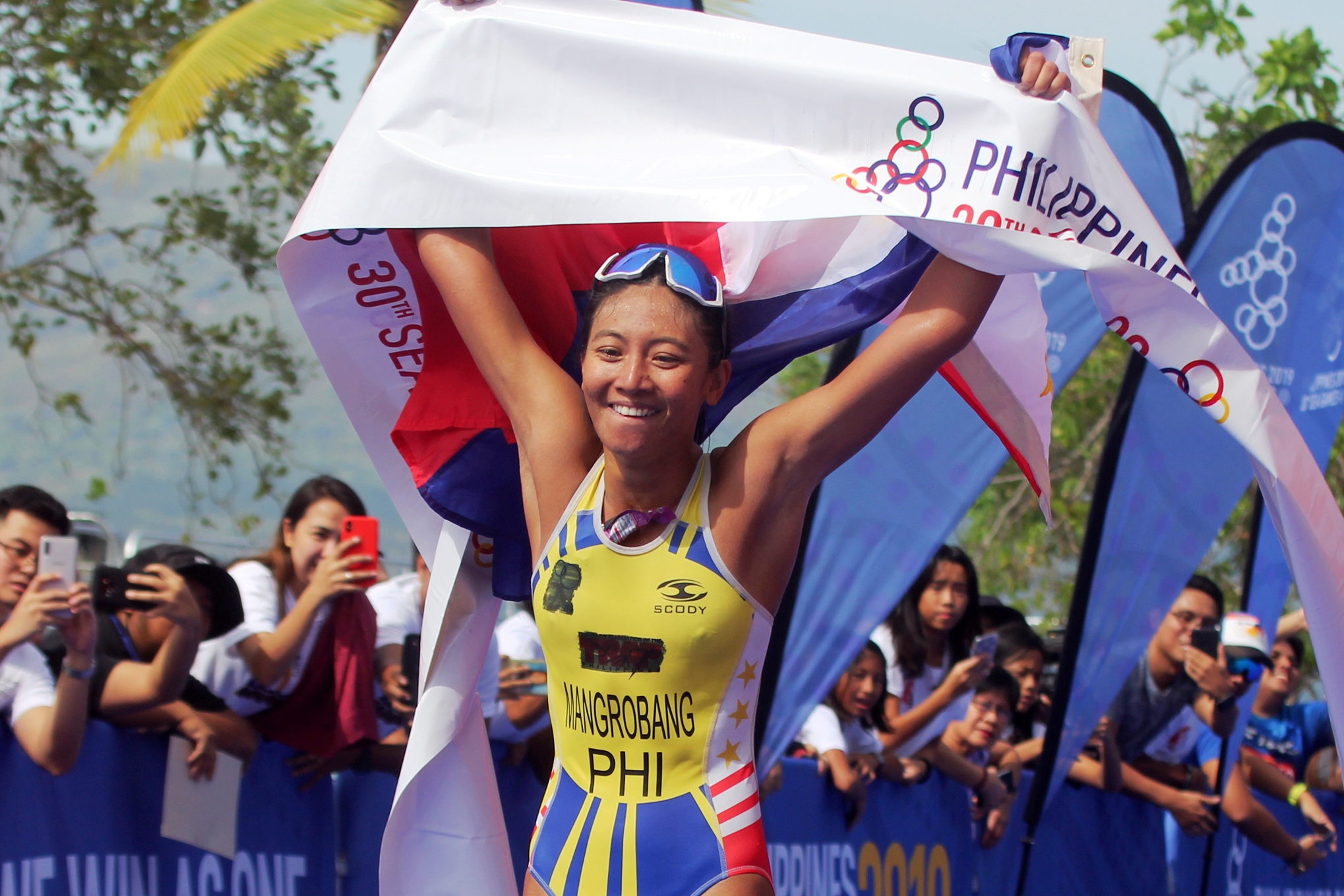 01dec - 2 - kim mangrobang for women's triathlon gold